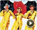 Merci Qui? N°22 - "Chantons sous la pluie"